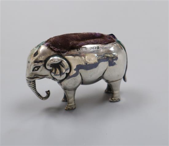 An Edwardian novelty silver pin cushion, modelled as an elephant, Sydney & Co, Birmingham, 1906, length 7cm.